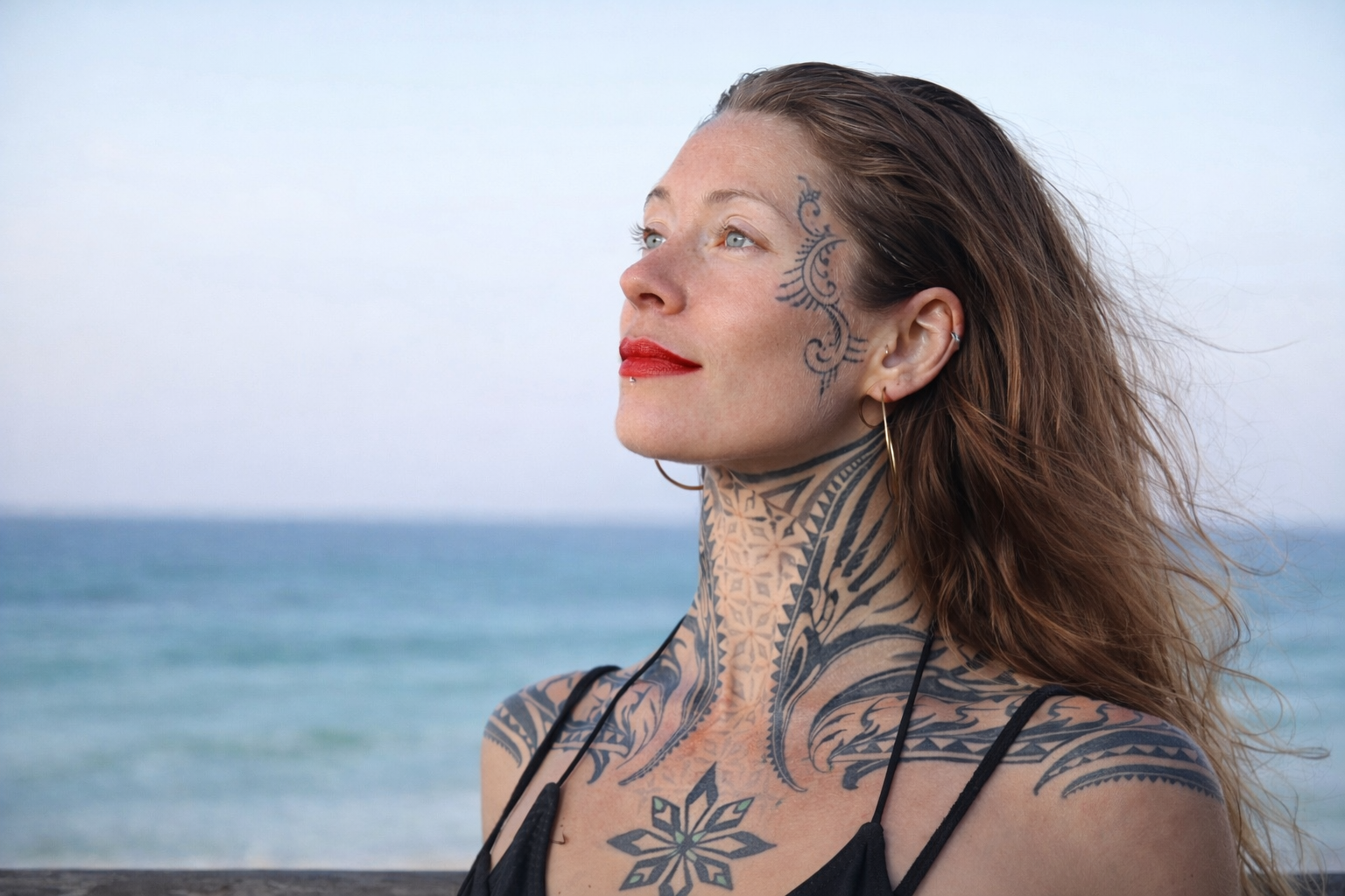 Kera Lynn, Co-Founder of Soulspire, by the ocean at golden hour